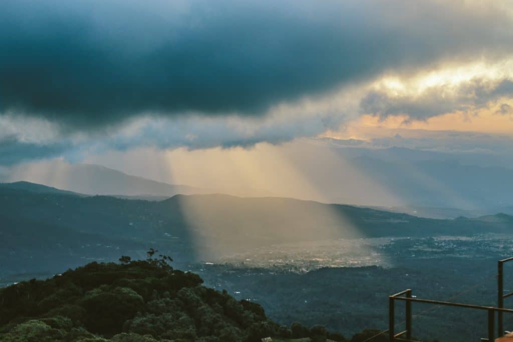 Photo by Luis Quintero: https://www.pexels.com/photo/sunlight-beaming-through-clouds-1624889/
