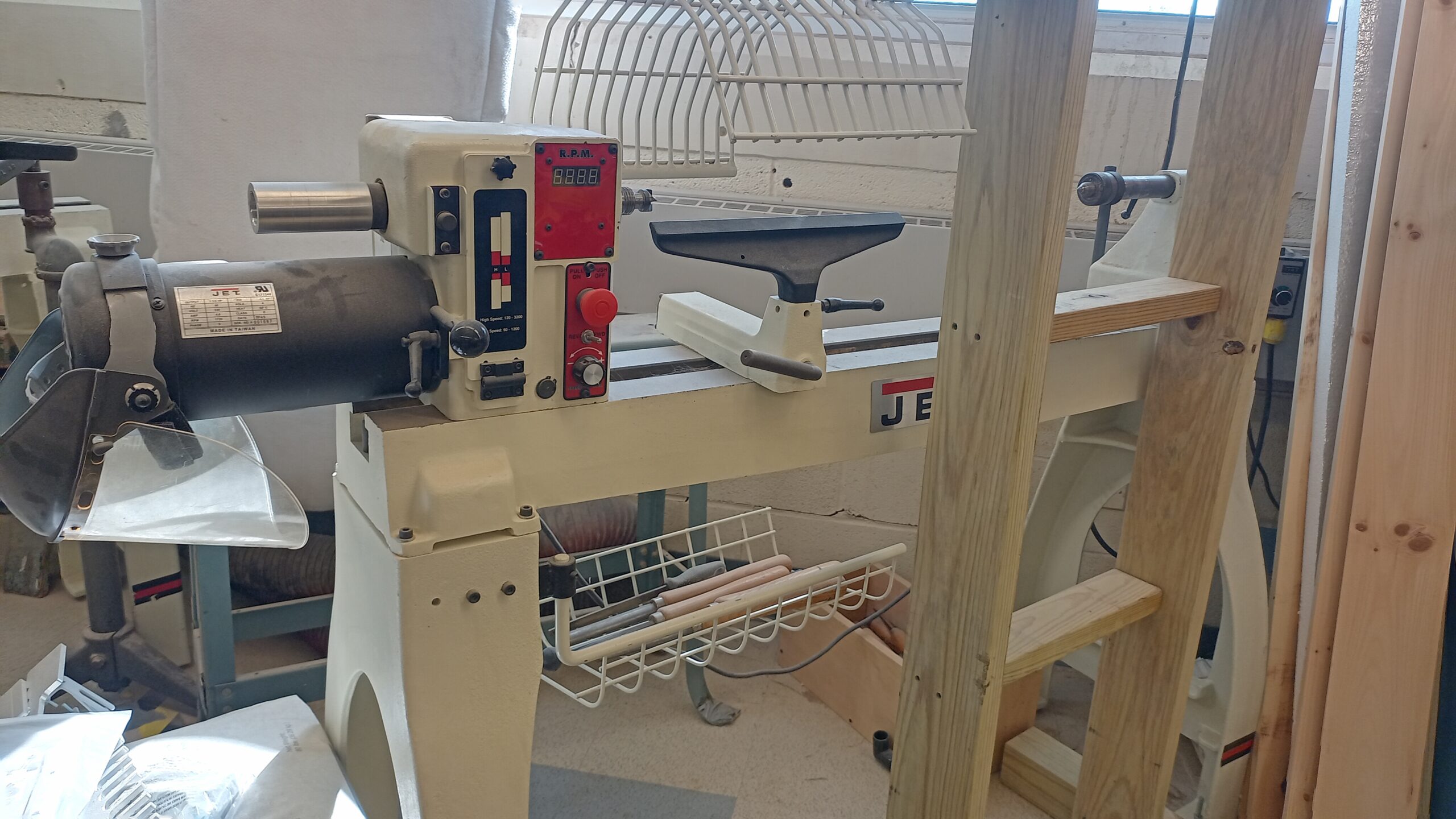 Another angle of wood lathe and surrounding tools